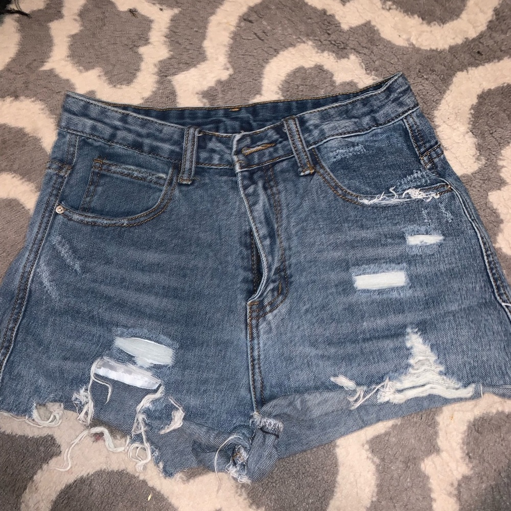 ripped denim blue Jean shorts